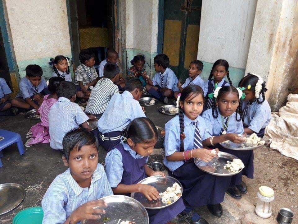 feeding-orphan-children-jcim